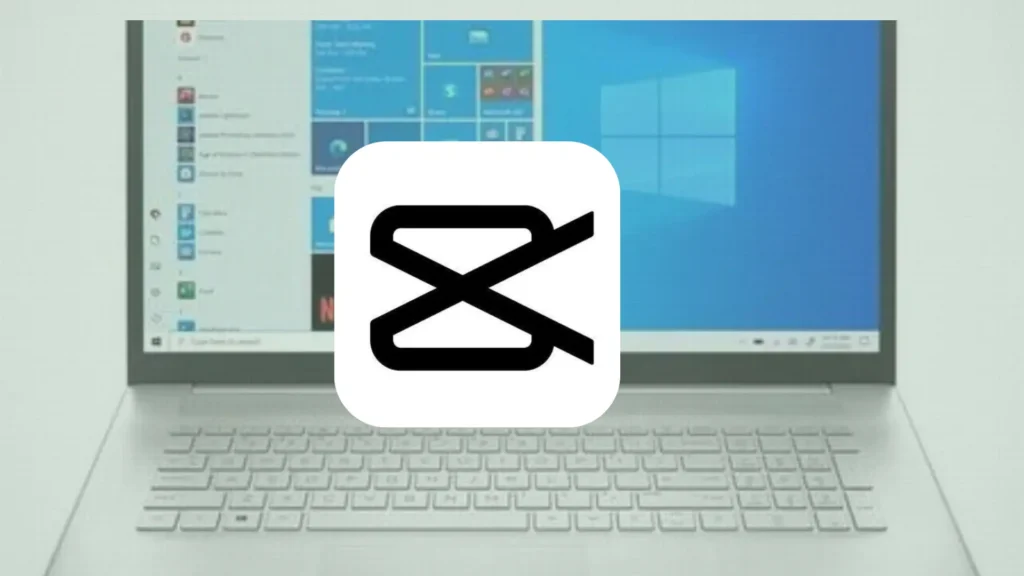 "CapCut logo displayed on a laptop screen with a Windows operating system in the background."